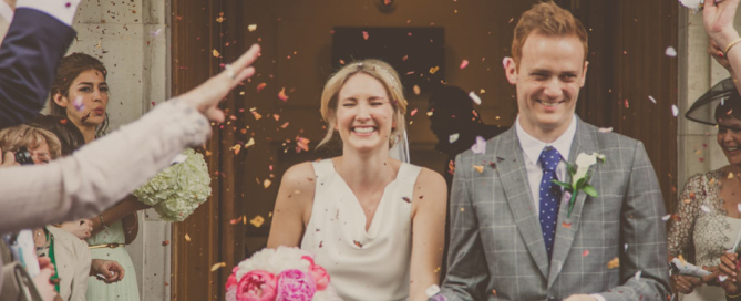 bride and groom showered with confetti, Hackney Town Hall wedding, Photographer wedding eastLondon, Documentary wedding photographer London, Photojournalist wedding photographer London, South East London wedding photographer